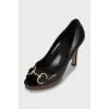 Leather shoes with wooden soles