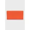 Orange wallet with embossed leather
