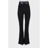 Black flared trousers with belt