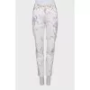 Printed jeans decorated with rhinestones