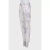 Printed jeans decorated with rhinestones