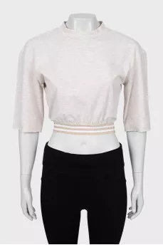 Beige top with lettering print