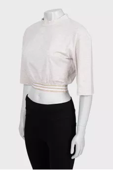 Beige top with lettering print