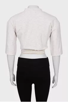 Beige top with lettering print