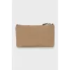 Textile clutch with brand logo