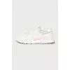 Men's white sneakers with brand logo
