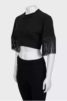 Black top decorated with fringe