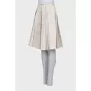 White pleated skirt