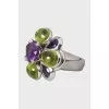 White gold ring with precious stones