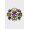 White gold ring with precious stones