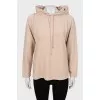 Beige hoodie with raised seams