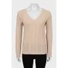 Beige sweater with decorative weave