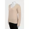 Beige sweater with decorative weave