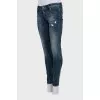 Tapered jeans with faded zip bottom