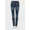 Tapered jeans with faded zip bottom