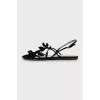Suede sandals decorated with petals