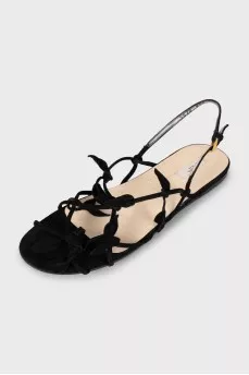 Suede sandals decorated with petals