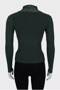 Green jumper with perforations
