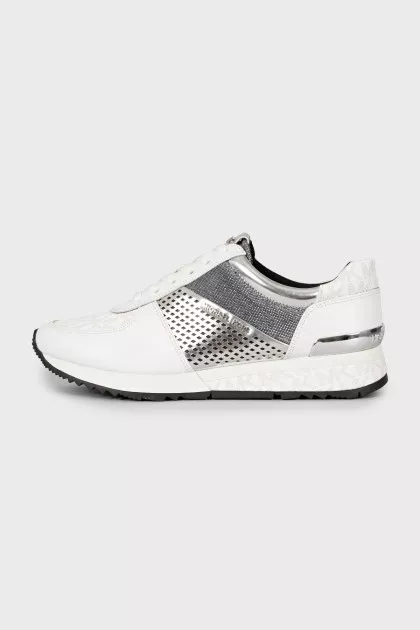 Sneakers with signature print and tag