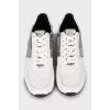 Sneakers with signature print and tag