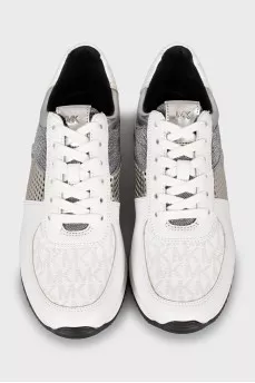 Sneakers with signature print and tag