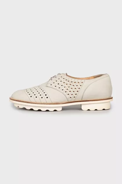 Perforated suede shoes