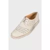 Perforated suede shoes