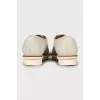 Perforated suede shoes