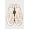Perforated suede shoes
