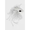 Brooch decorated with feather