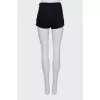 Mini shorts with golden decoration
