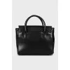 Satchel bag with embossed leather