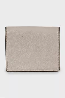 Leather wallet with metal logo