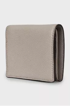 Leather wallet with metal logo