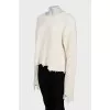 Knitted sweater with ripped effect