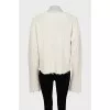 Knitted sweater with ripped effect