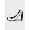 Black and white patent leather shoes