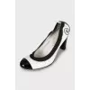 Black and white patent leather shoes