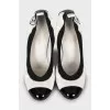 Black and white patent leather shoes
