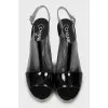 Patent sandals with transparent inserts