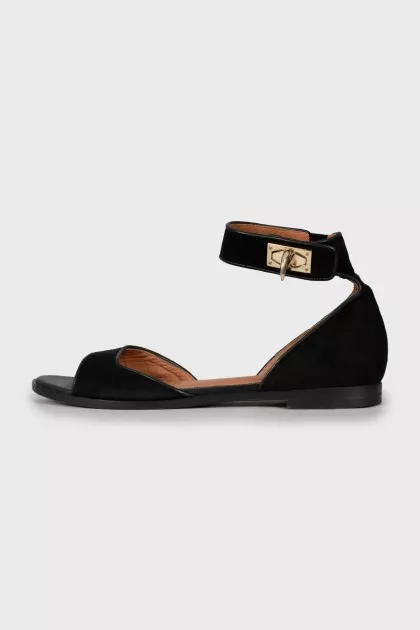 Suede sandals with twist closure