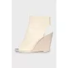 Open toe wedge boots