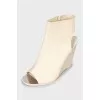 Open toe wedge boots