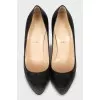 Black leather pointed toe shoes