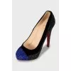Velvet shoes decorated with rhinestones