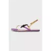 Leather sandals decorated with a bow