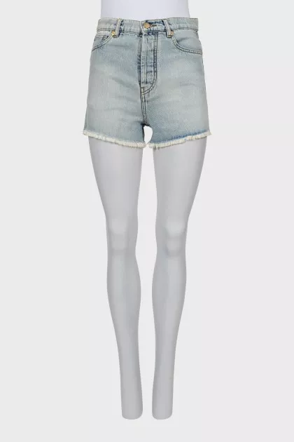 Blue denim shorts with raw hem