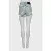 Blue denim shorts with raw hem