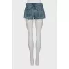 Distressed denim shorts