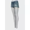 Distressed denim shorts